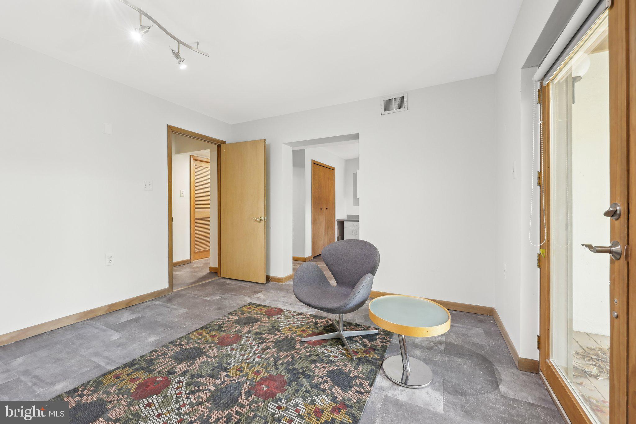 1503 Inlet Court Reston, VA 20190 - Photo 36 of 59 a living room with furniture a window and a rug