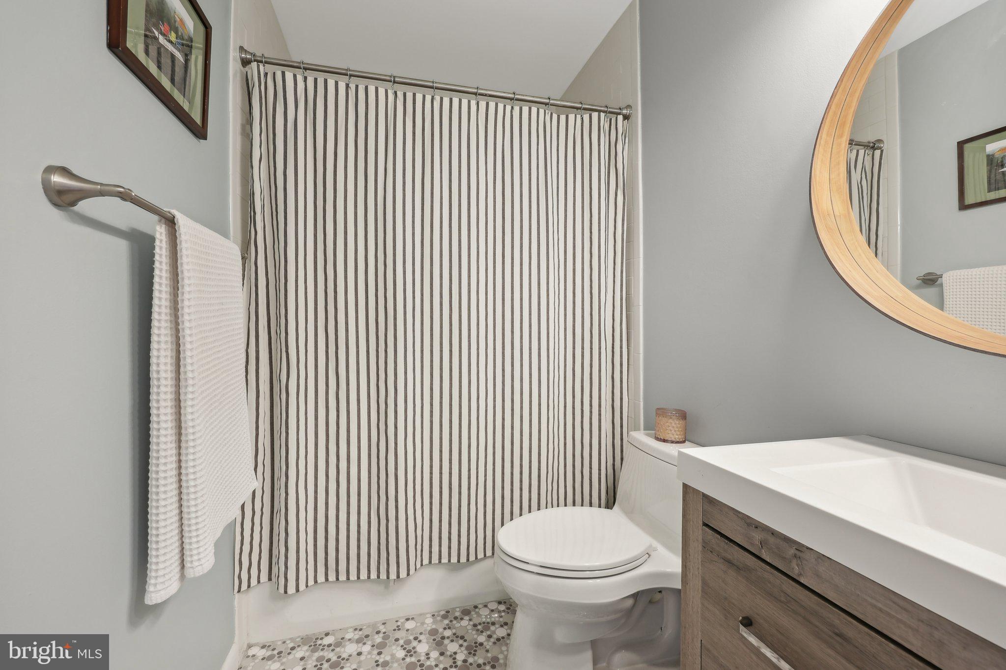 1503 Inlet Court Reston, VA 20190 - Photo 42 of 59 a bathroom with a sink and toilet