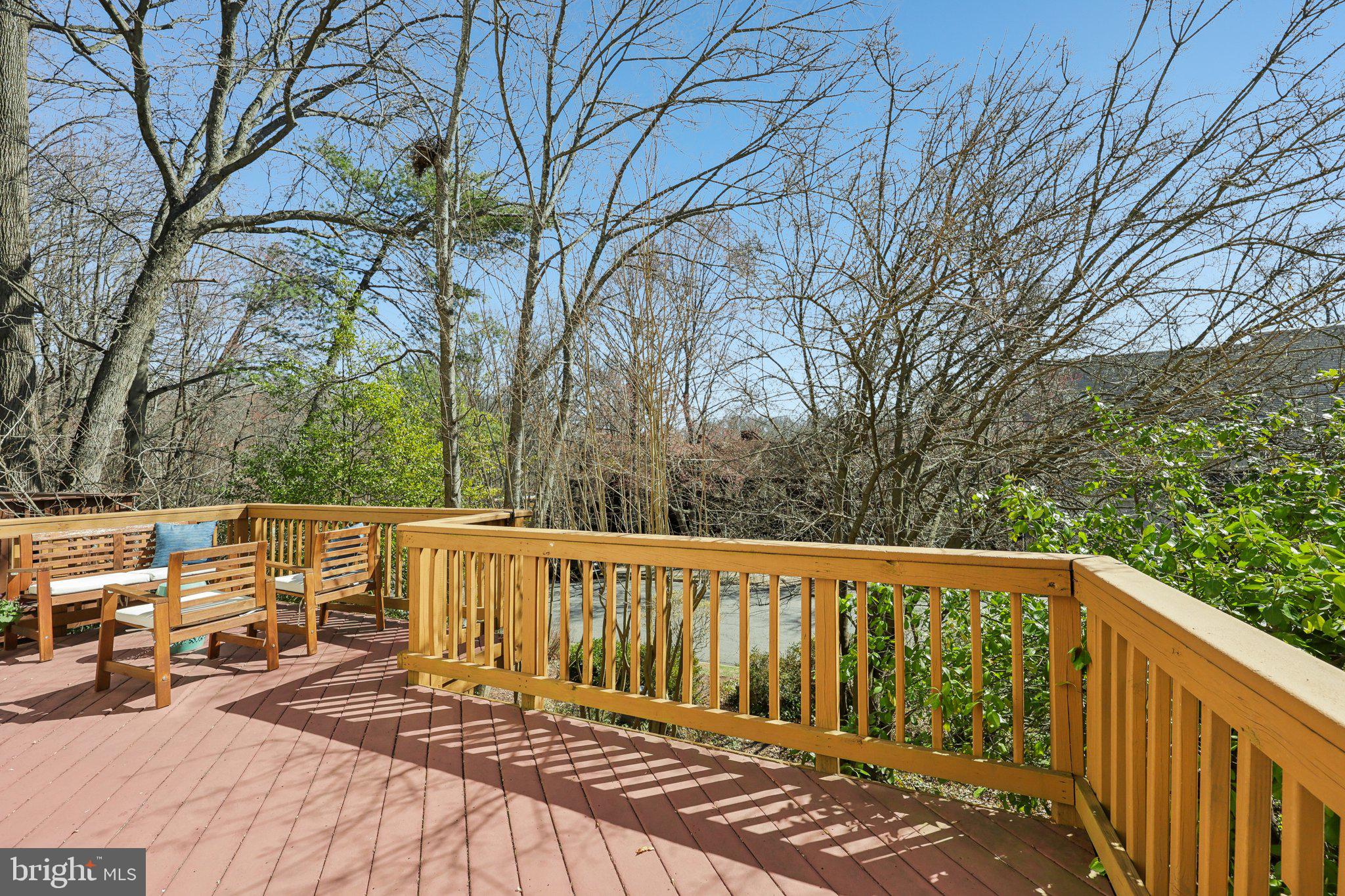 1503 Inlet Court Reston, VA 20190 - Photo 45 of 59 a view of balcony with wooden floor and fence
