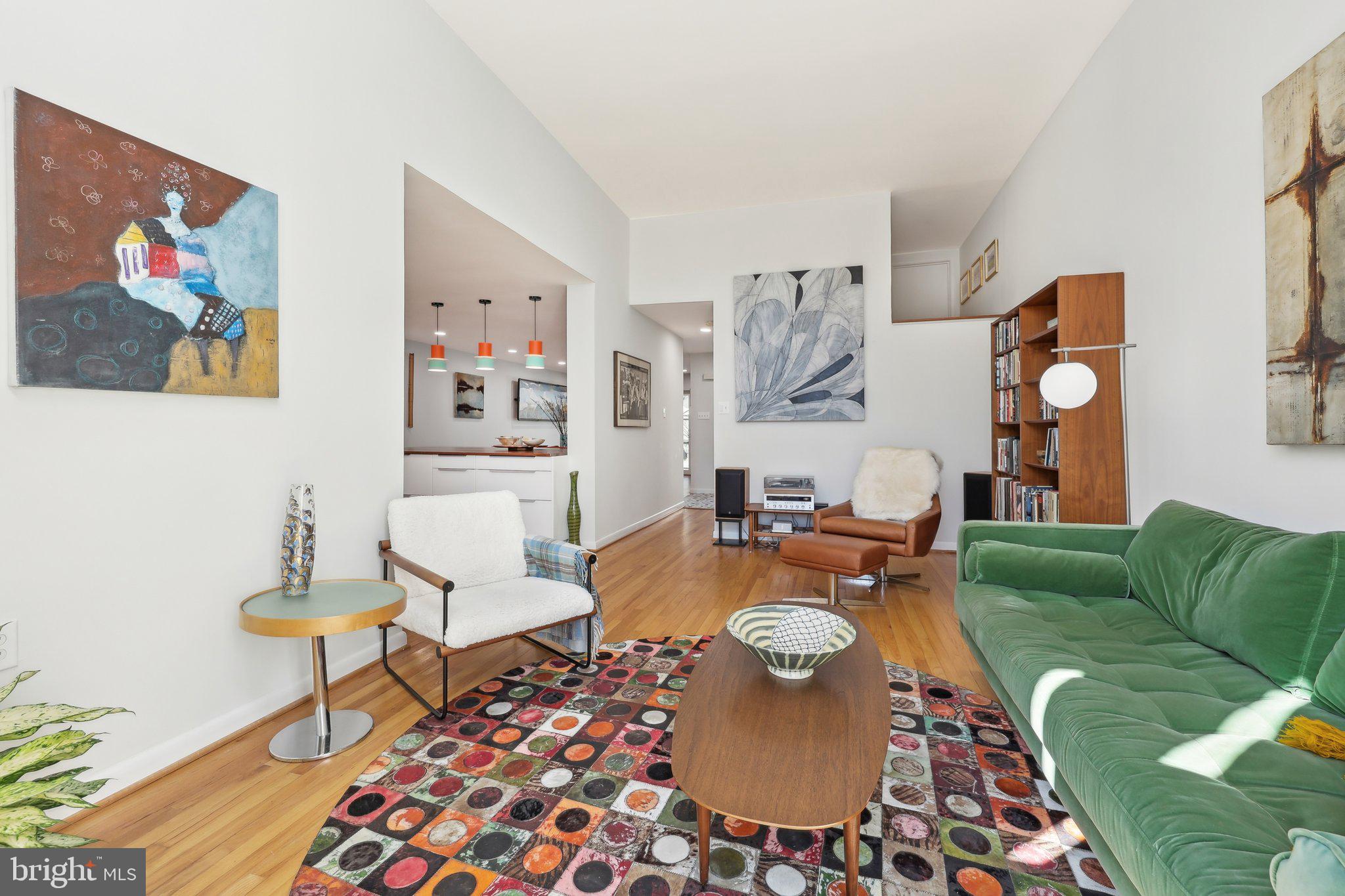 1503 Inlet Court Reston, VA 20190 - Photo 5 of 59 a living room with furniture and a couch