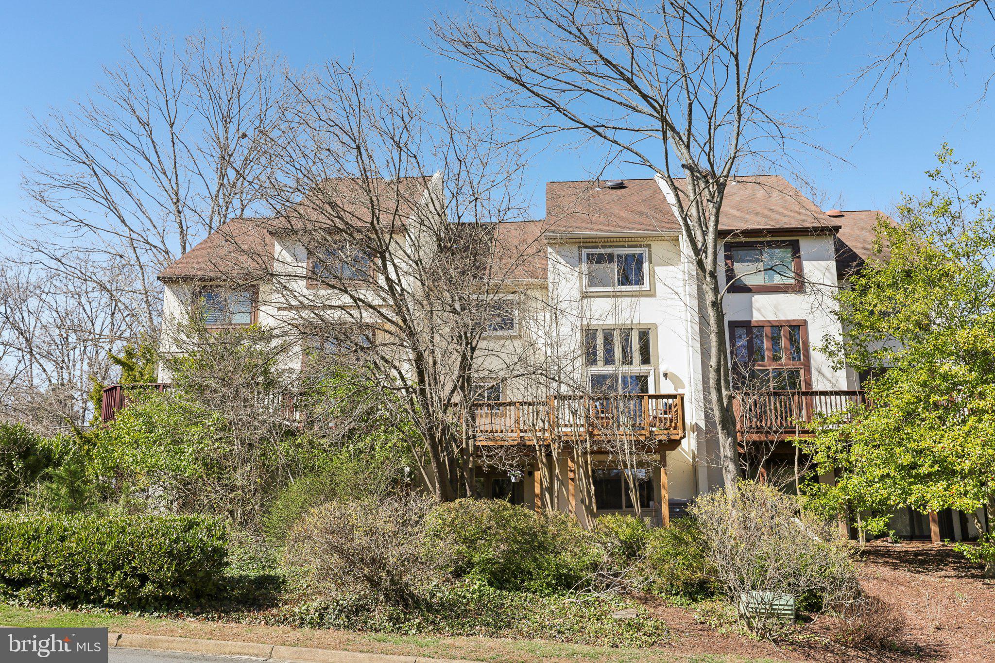 1503 Inlet Court Reston, VA 20190 - Photo 52 of 59 a front view of a house with a yard