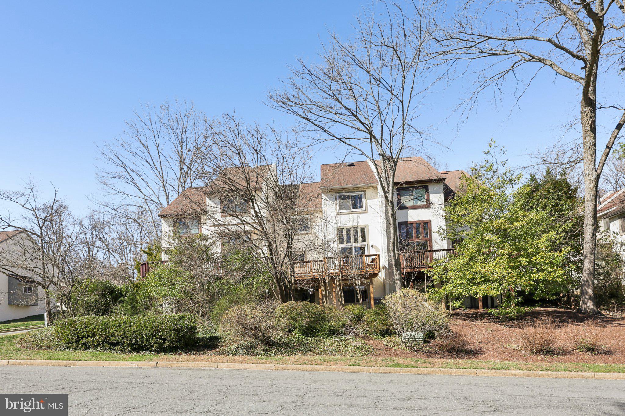 1503 Inlet Court Reston, VA 20190 - Photo 53 of 59 a view of a white house with a street