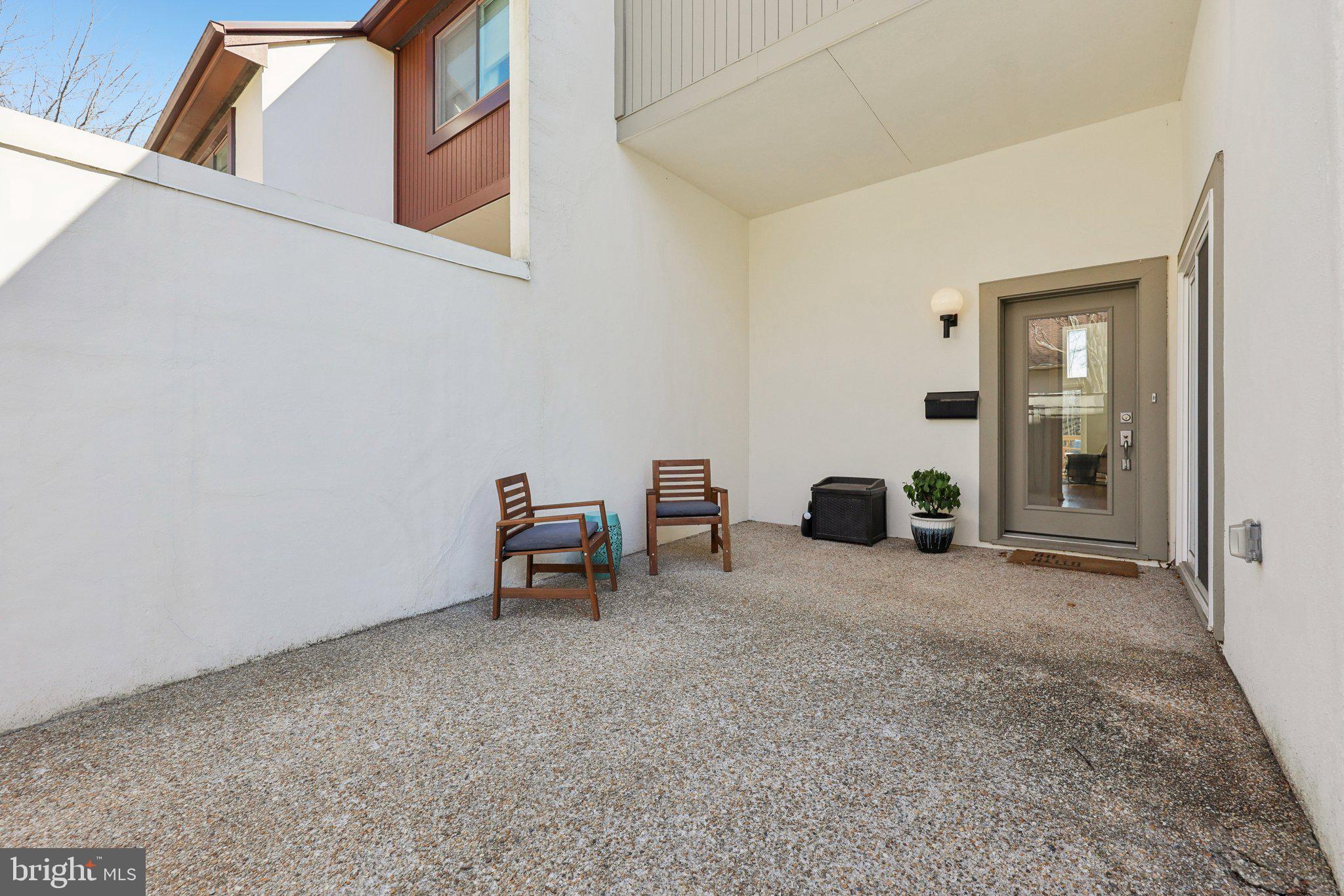 1503 Inlet Court Reston, VA 20190 - Photo 54 of 59 a view of a livingroom with a chair and a barbeque grill