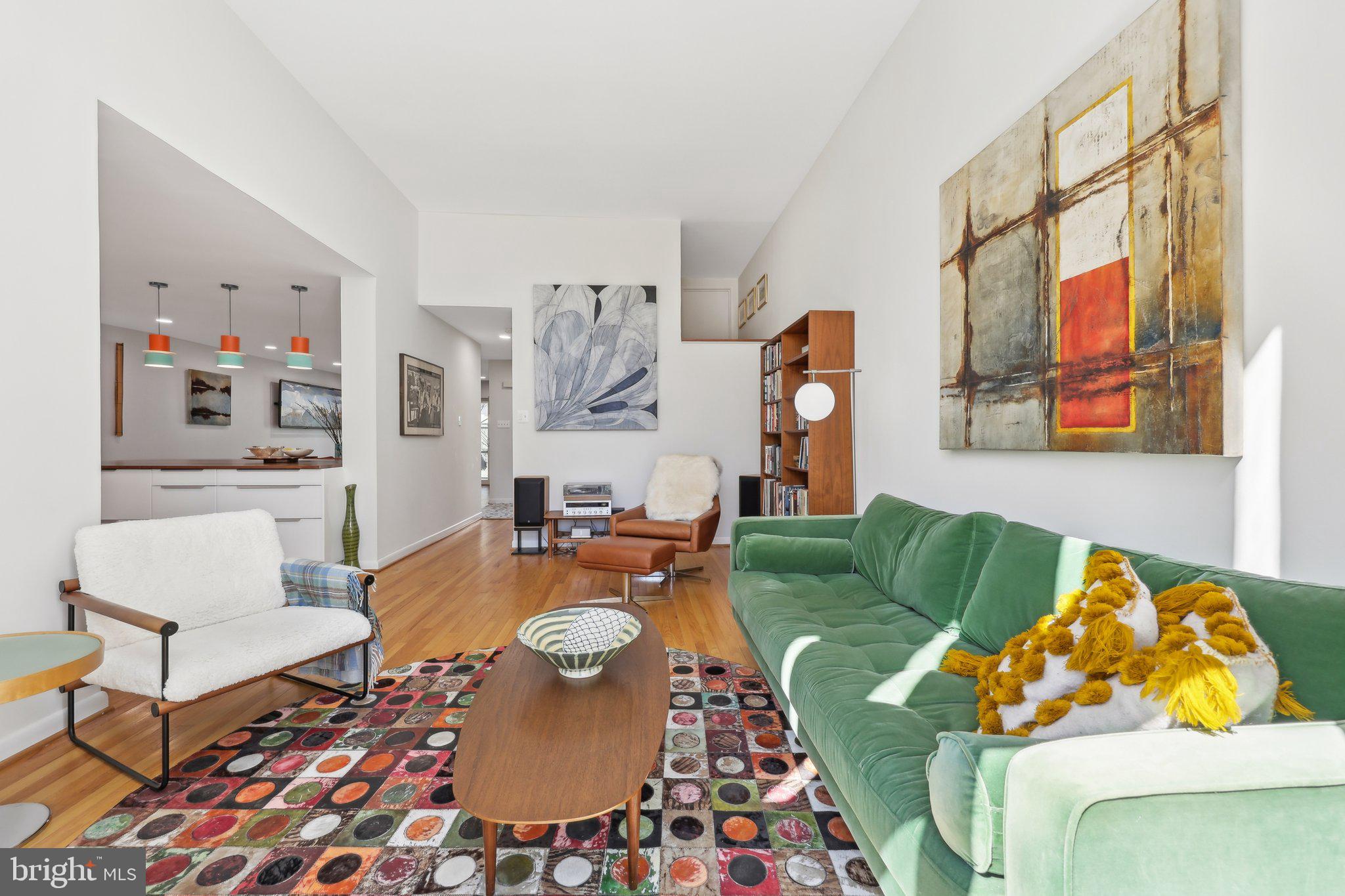 1503 Inlet Court Reston, VA 20190 - Photo 6 of 59 a living room with furniture and a table
