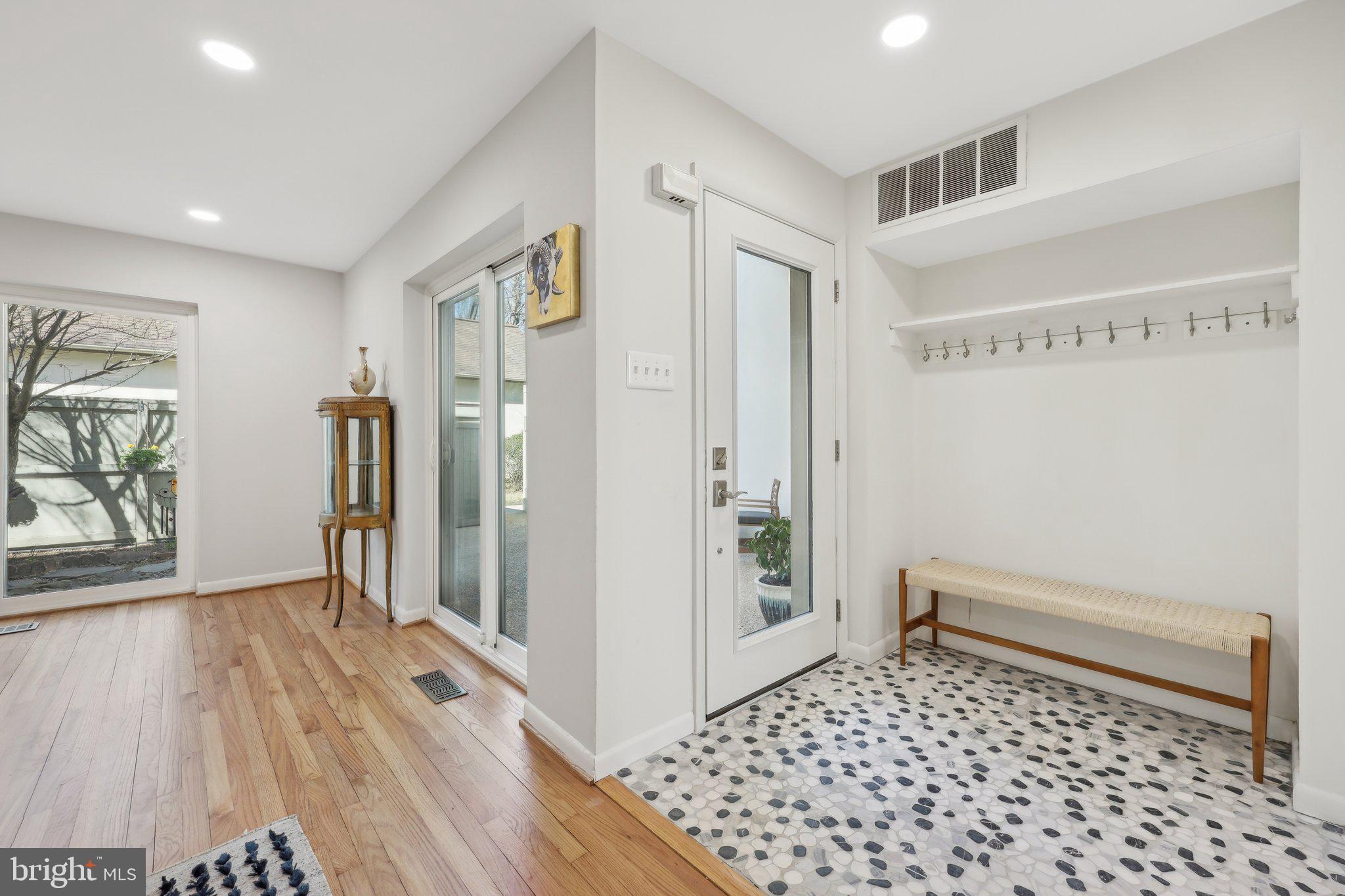 1503 Inlet Court Reston, VA 20190 - Photo 7 of 59 a room with a wooden floor and a rug