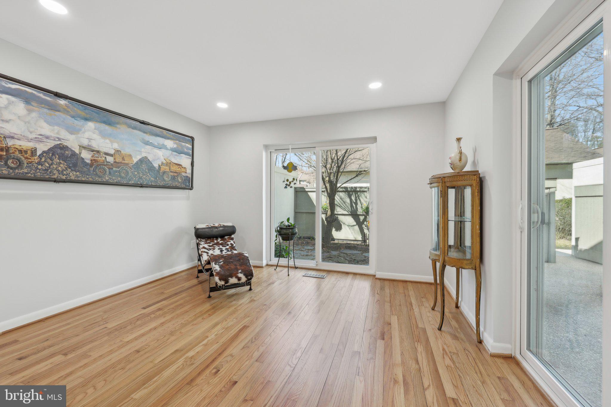 1503 Inlet Court Reston, VA 20190 - Photo 9 of 59 a room with furniture and wooden floor