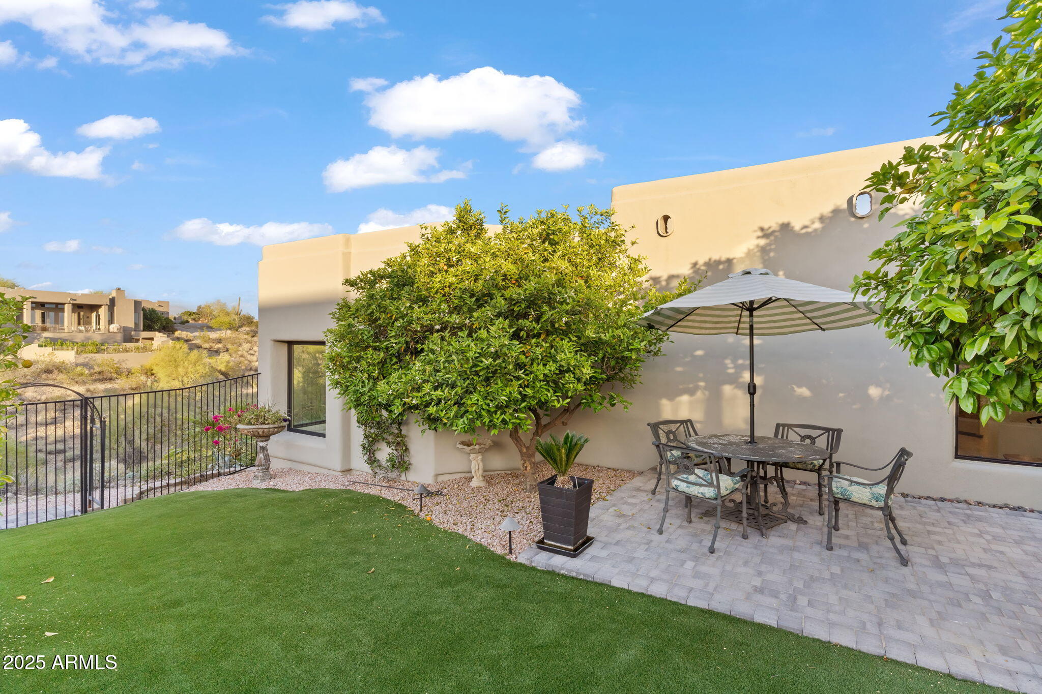 15730 East Eagle Crest Road Fountain Hills, AZ 85268 - Photo 50 of 77 a view of a chairs and table in backyard