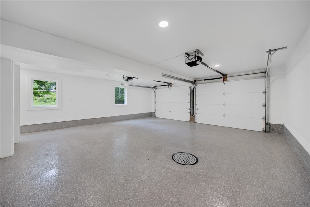 157 Crescent Hill Road Perinton, NY 14534 - Photo 34 of 47 SPACIOUS TWO CAR GARAGE WITH NEW EPOXY FLOOR