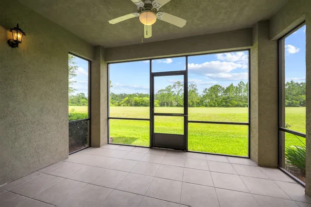 a view of a lake with houses in the back