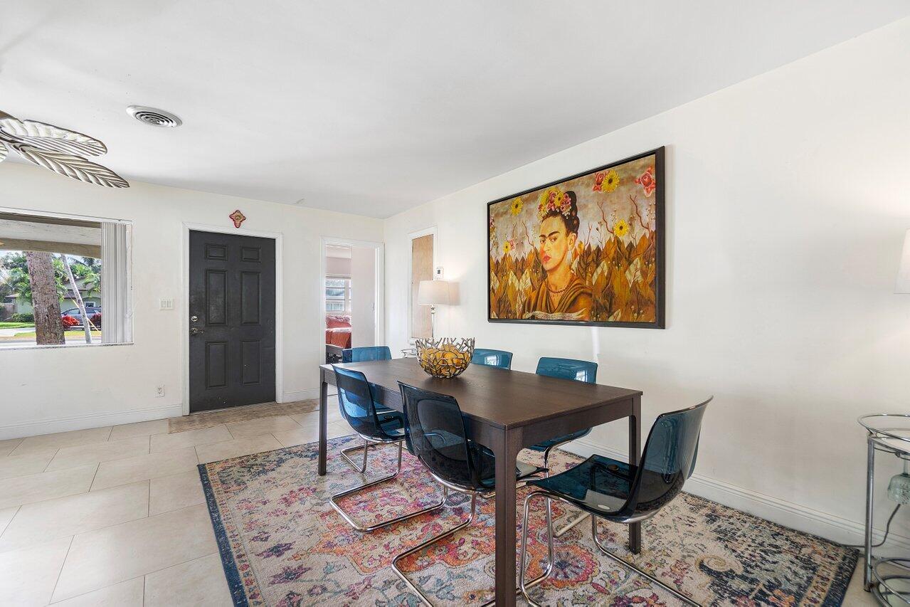 1069 West Camino Real Boca Raton, FL 33486 - Photo 8 of 21 a workspace with furniture and window