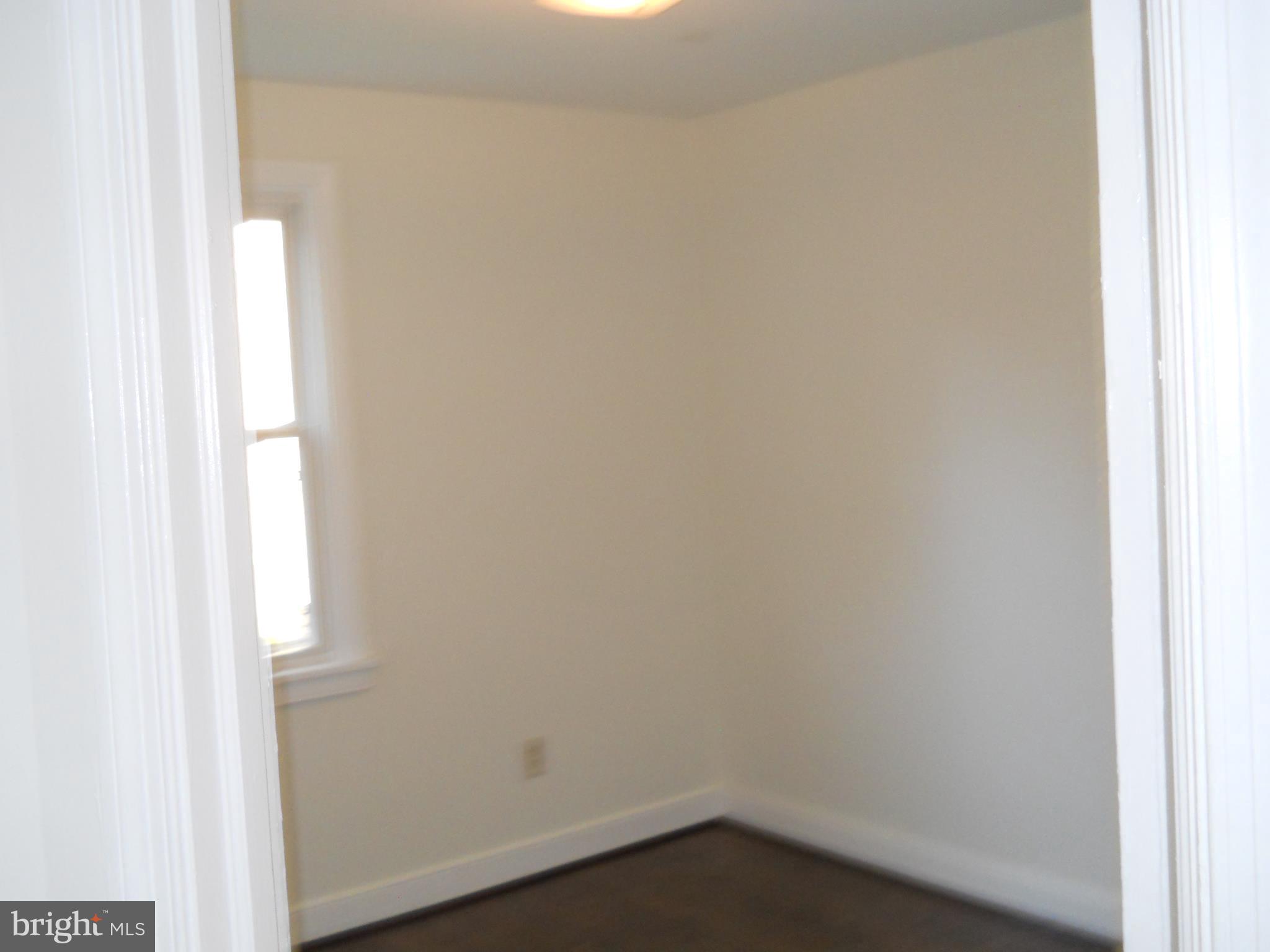 12323 Judson Road Silver Spring, MD 20906 - Photo 13 of 52 MAIN LEVEL BEDROOM WITH HARDWOOD FLOORS