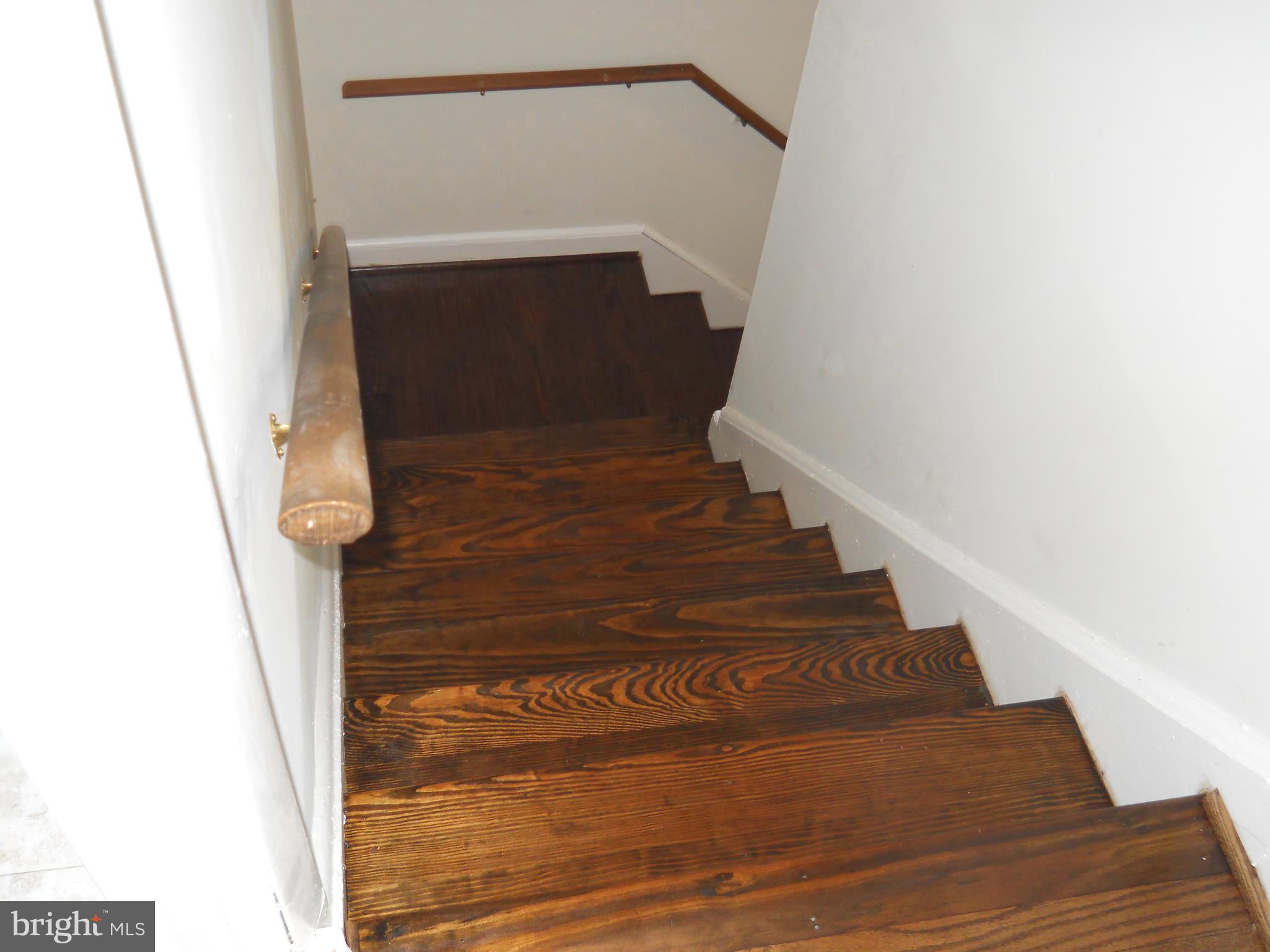 12323 Judson Road Silver Spring, MD 20906 - Photo 26 of 52 VIEW OF STAIRCASE FROM UPPER LEVEL
