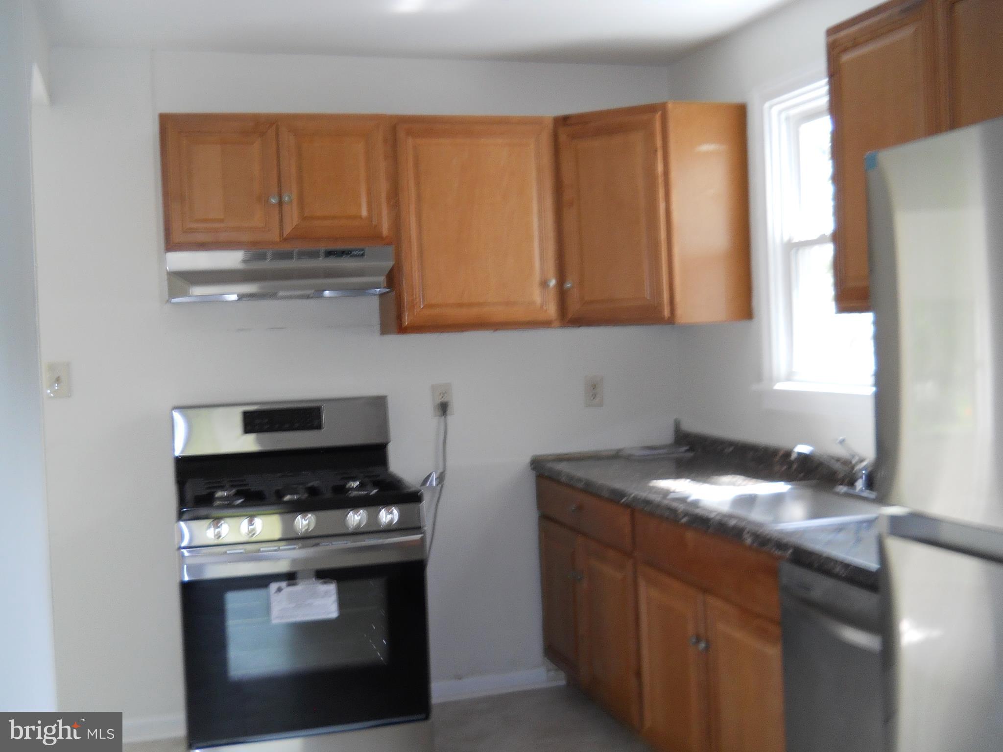 12323 Judson Road Silver Spring, MD 20906 - Photo 29 of 52 KITCHEN WITH STAINLESS STEEL APPLIANCES