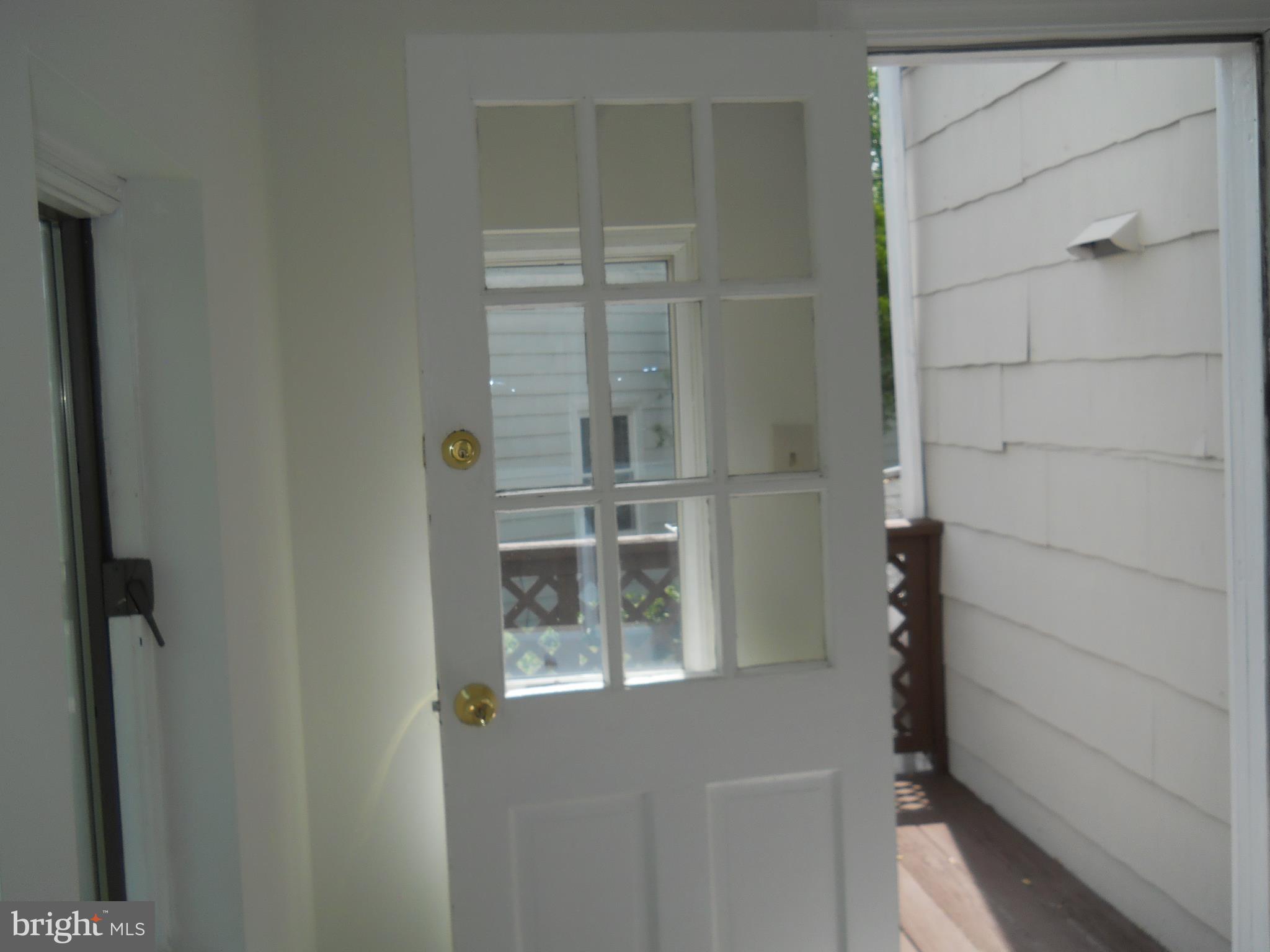 12323 Judson Road Silver Spring, MD 20906 - Photo 31 of 52 EAT-IN AREA FROM KITCHEN TO EXIT DOOR/DECK