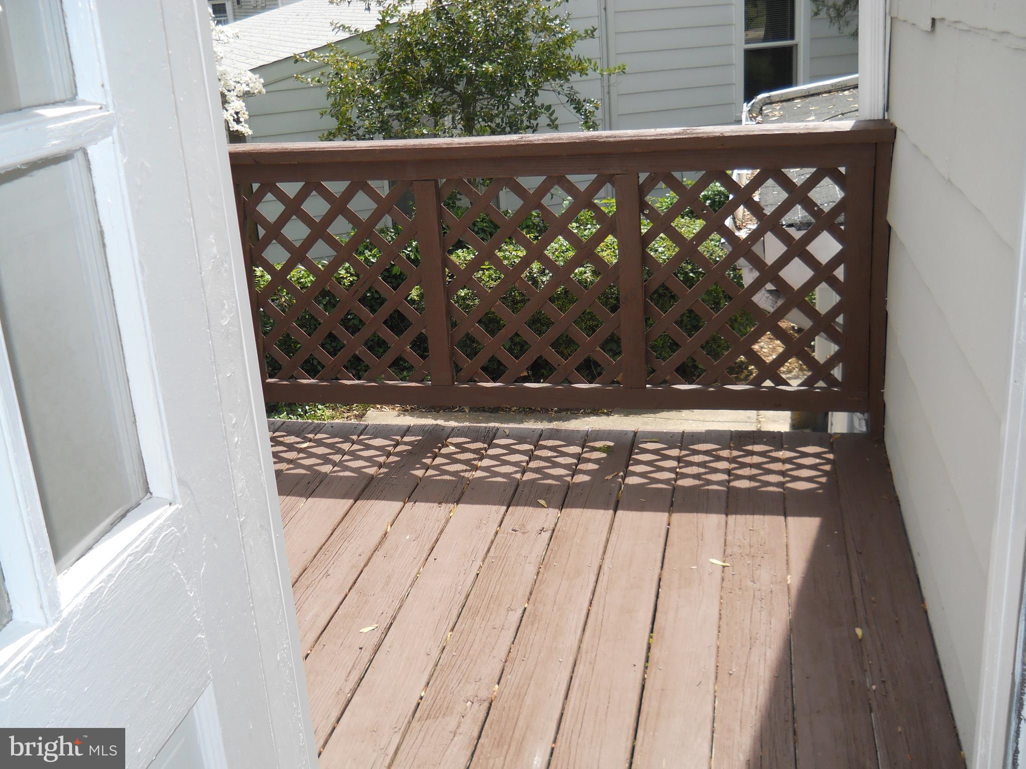 12323 Judson Road Silver Spring, MD 20906 - Photo 33 of 52 DECK WITH STAIRS TO BACKYARD