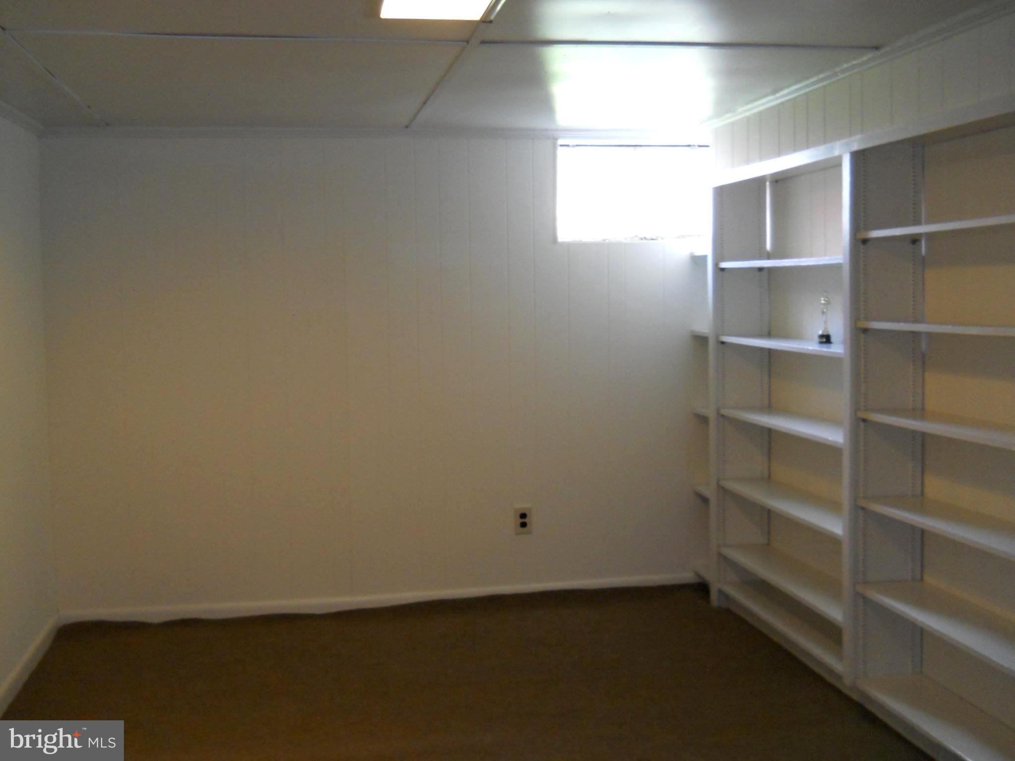 12323 Judson Road Silver Spring, MD 20906 - Photo 37 of 52 LIBRARY WITH BUILT-IN BOOKSHELVES