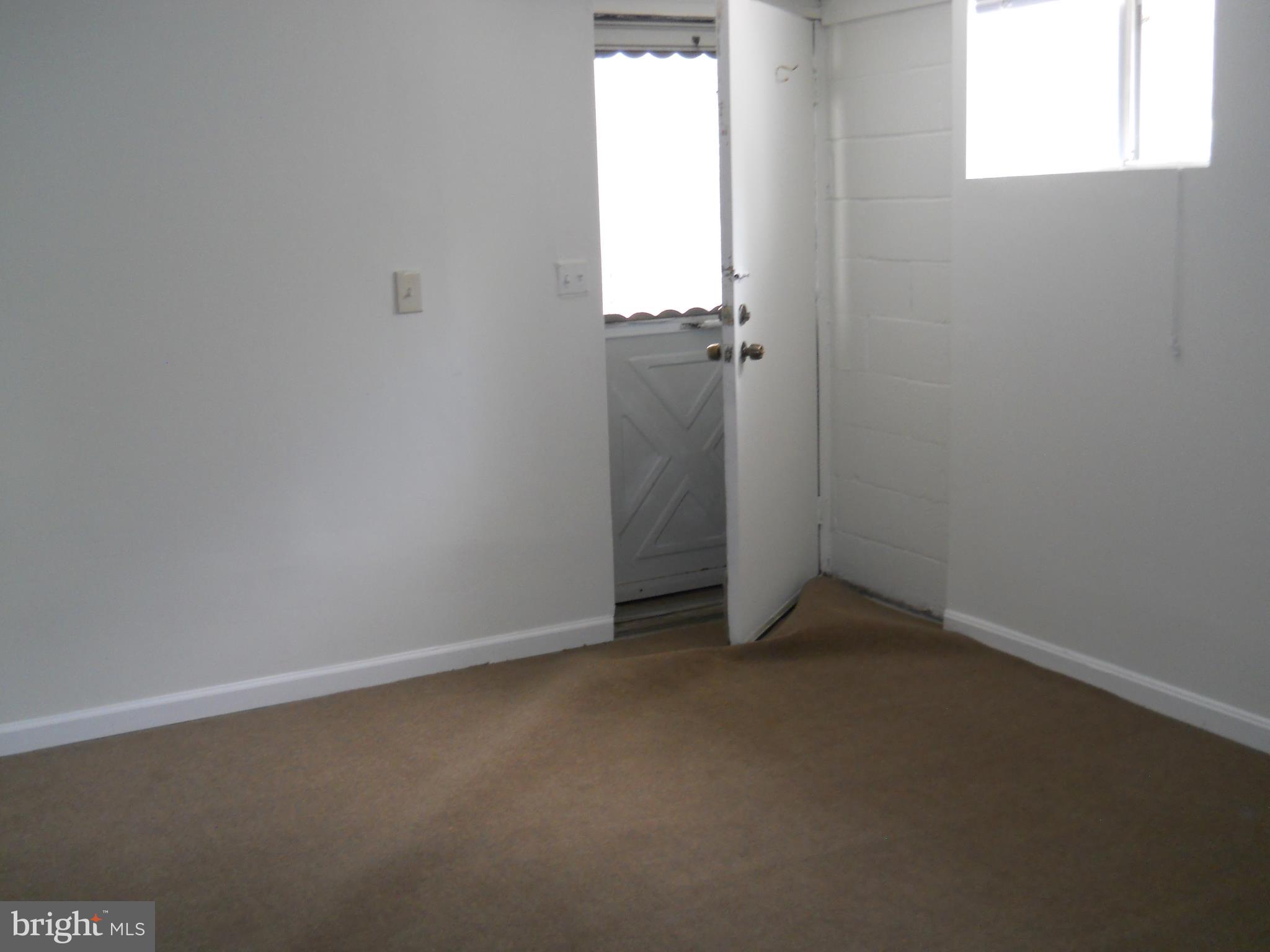 12323 Judson Road Silver Spring, MD 20906 - Photo 40 of 52 EXIT DOOR TO BACKYARD FROM LOWER LEVEL