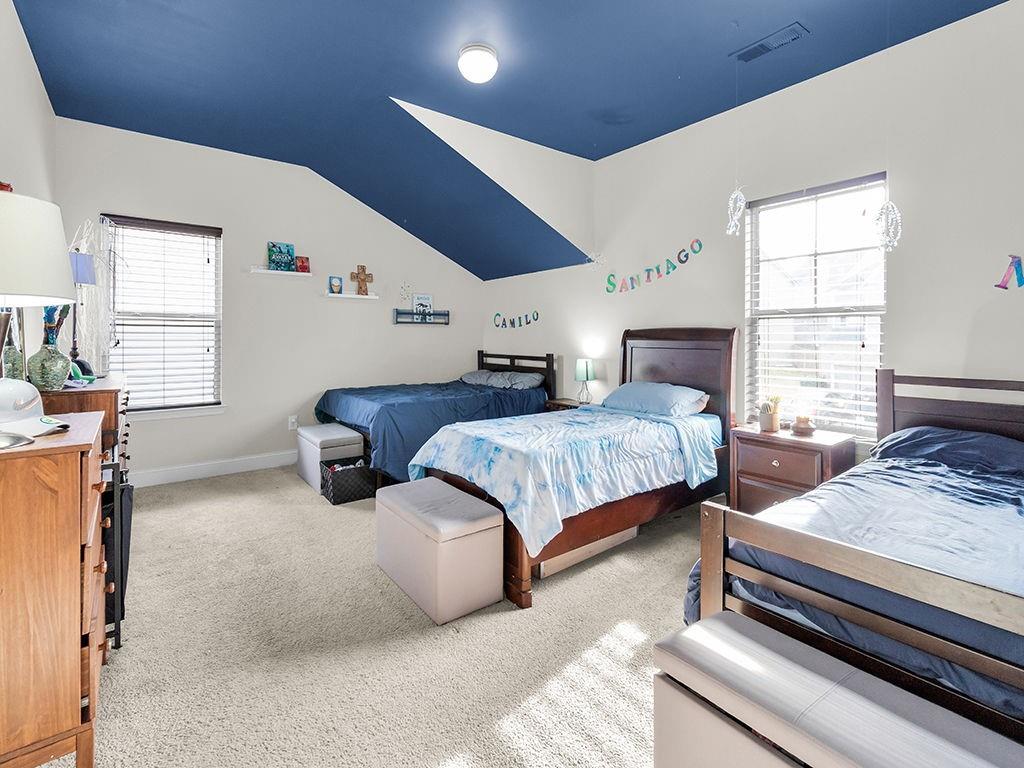 5110 Rialto Way Cumming, GA 30040 - Photo 26 of 50 a bedroom with bed and window