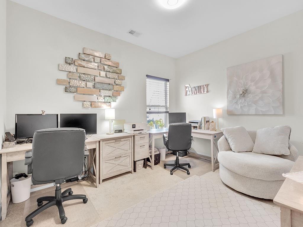 5110 Rialto Way Cumming, GA 30040 - Photo 29 of 50 a view of a livingroom with workspace and a couch