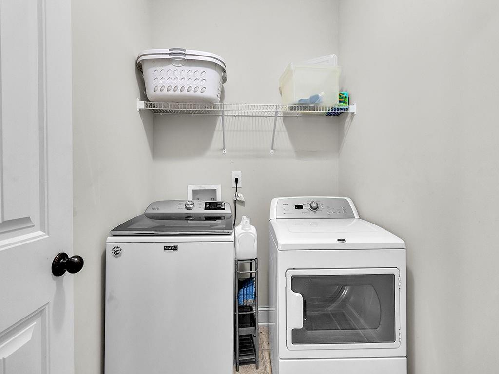 5110 Rialto Way Cumming, GA 30040 - Photo 31 of 50 a utility room with dryer and washer