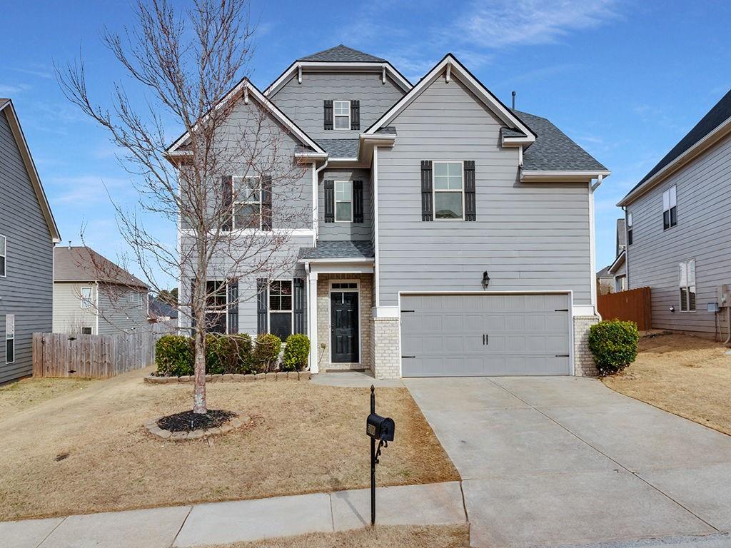 5110 Rialto Way Cumming, GA 30040 - Photo 4 of 50 a front view of a house with entertaining space