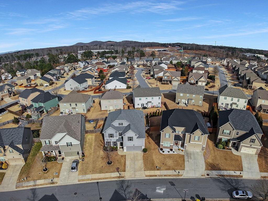 5110 Rialto Way Cumming, GA 30040 - Photo 41 of 50 an aerial view of residential houses with outdoor space