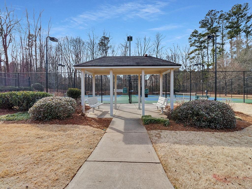 5110 Rialto Way Cumming, GA 30040 - Photo 47 of 50 a view of a house with backyard and sitting area