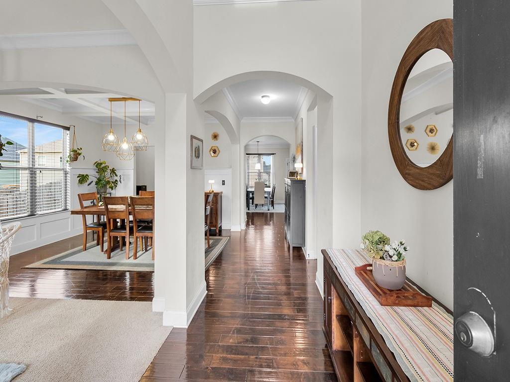 5110 Rialto Way Cumming, GA 30040 - Photo 7 of 50 a living room with furniture and a chandelier