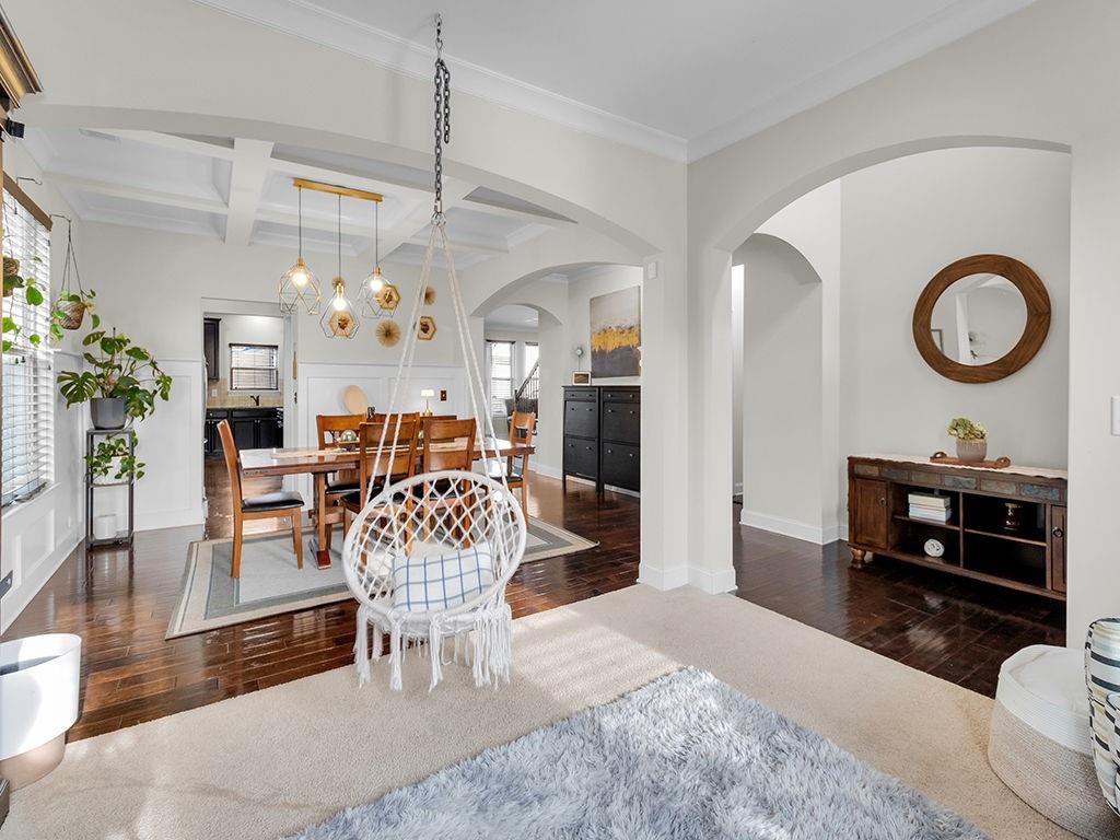 5110 Rialto Way Cumming, GA 30040 - Photo 9 of 50 a living room with furniture a dining table and chairs