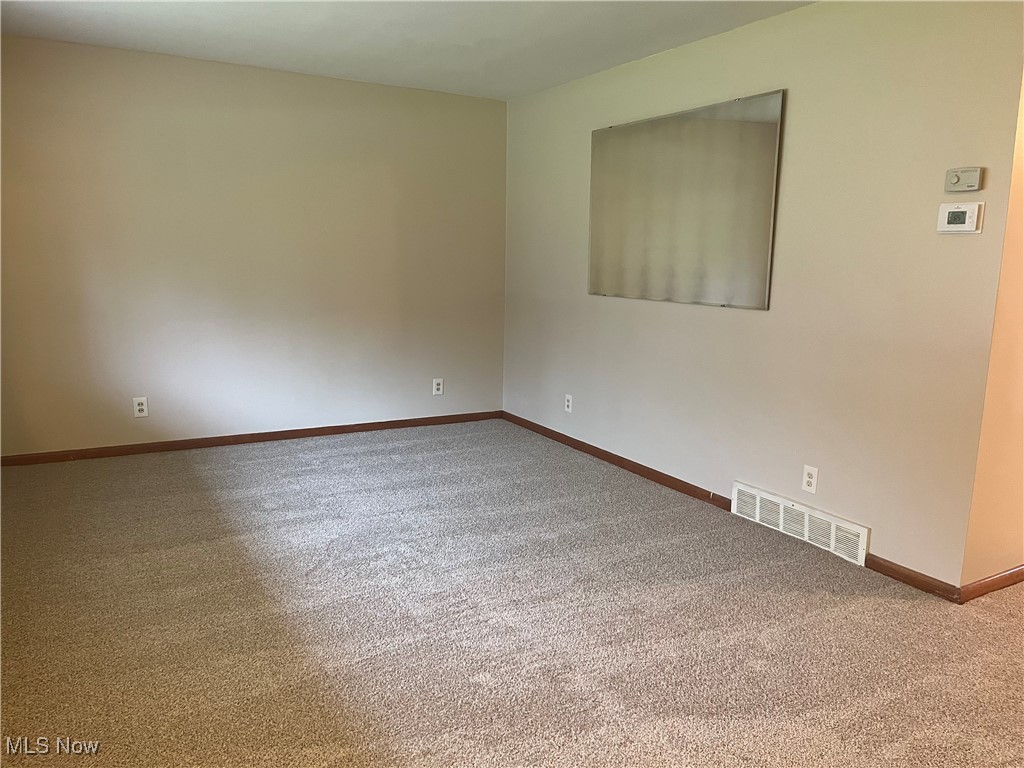 9152 Fosdick Road Cleveland, OH 44125 - Photo 15 of 45 Large Living Room with new carpeting.