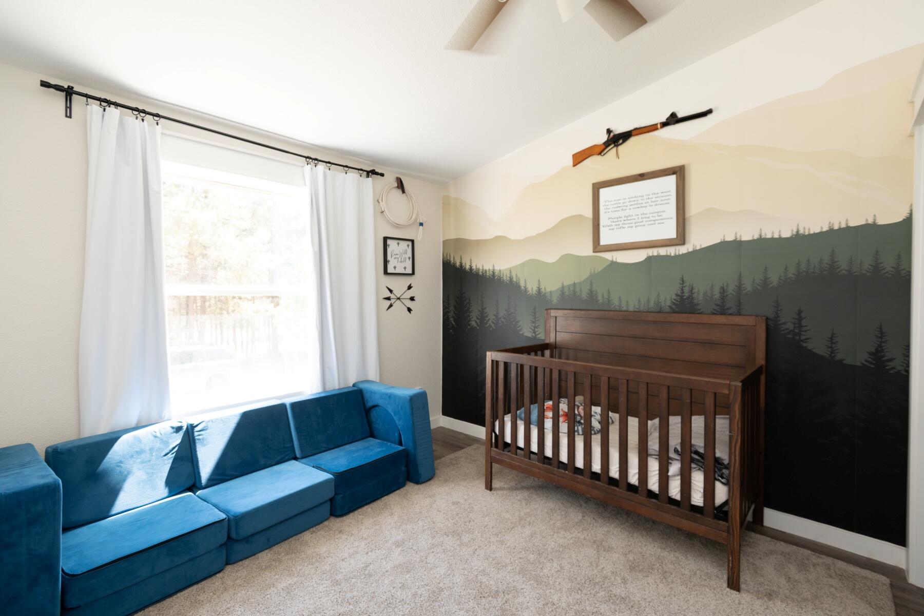 16990 Covina Road Bend, OR 97707 - Photo 34 of 56 a bedroom with furniture and a window