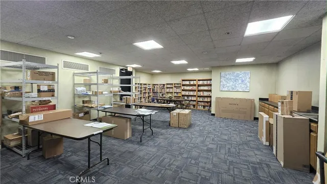 a view of a workspace with furniture