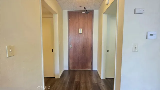 a view of a bathroom with a glass door shower and a fireplace