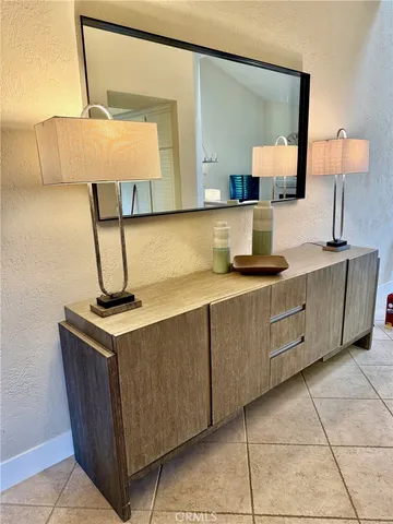a kitchen with stainless steel appliances granite countertop a sink and a cabinets