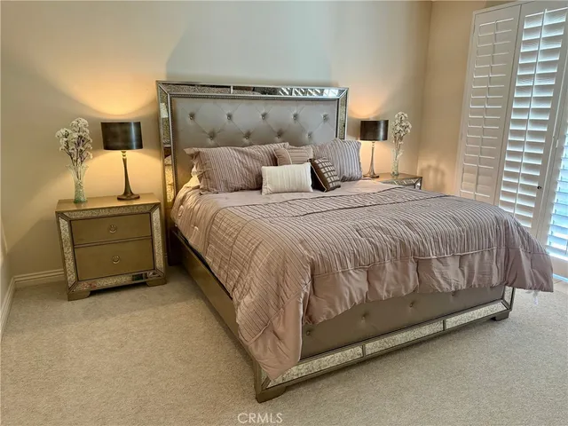 a living room with furniture and flat screen tv