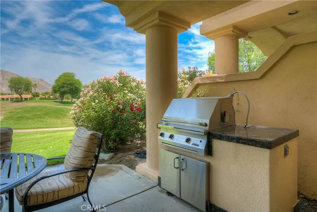 a view of swimming pool with lounge chair