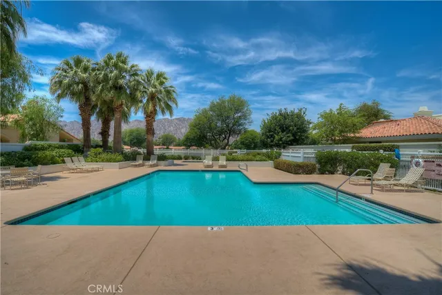 an aerial view of houses with yard