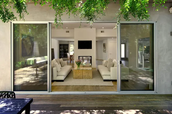 a view of living room filled with furniture