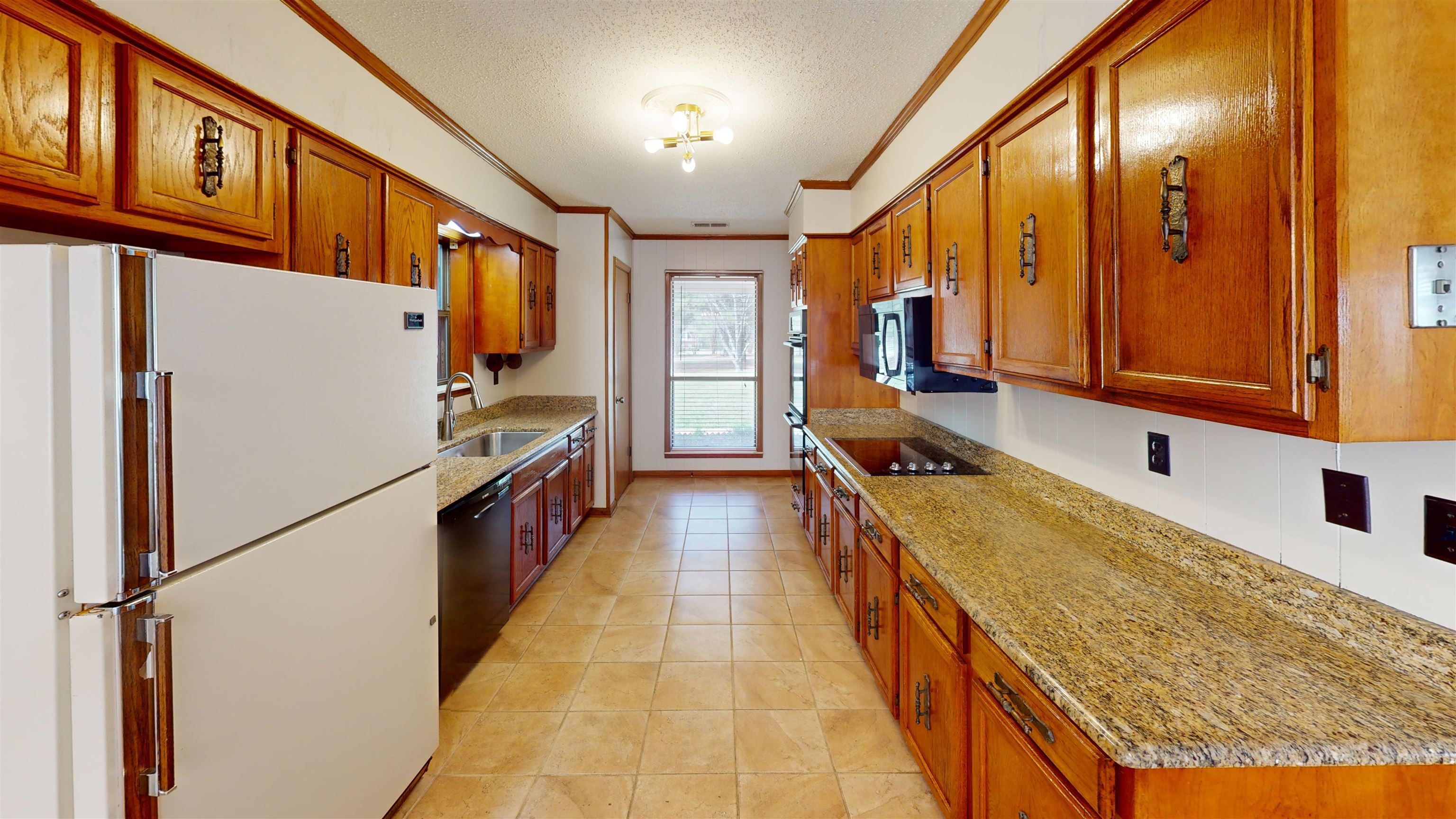 4800 Highway 196 Piperton, TN 38017 - Photo 11 of 37 a kitchen with stainless steel appliances granite countertop a refrigerator and a stove