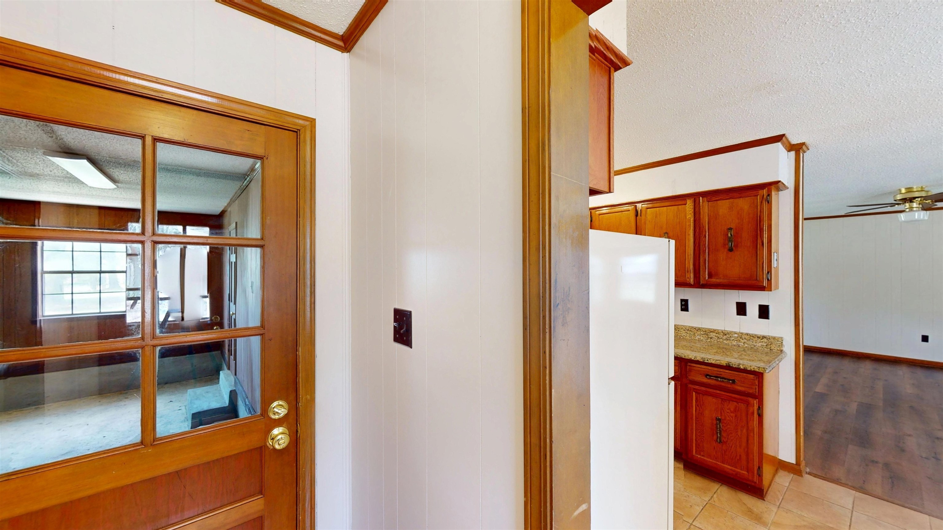 4800 Highway 196 Piperton, TN 38017 - Photo 15 of 37 a hallway with sliding door and wooden floor