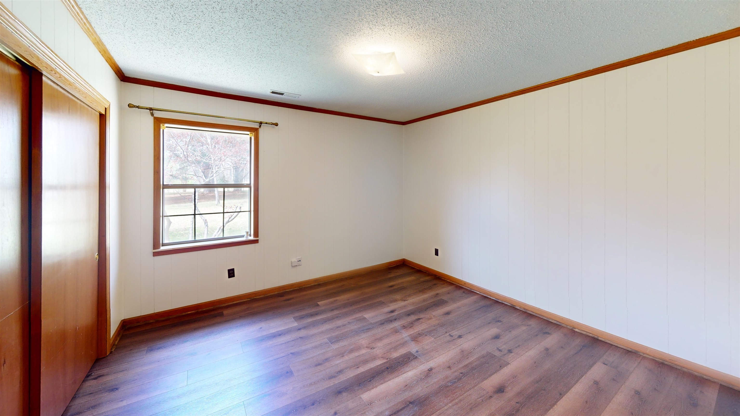 4800 Highway 196 Piperton, TN 38017 - Photo 28 of 37 an empty room with wooden floor and windows