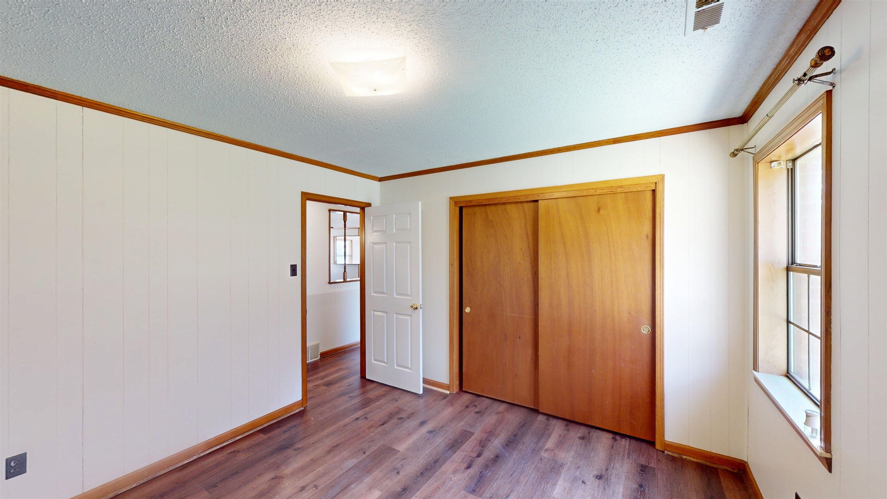 4800 Highway 196 Piperton, TN 38017 - Photo 29 of 37 an empty room with wooden floor and windows