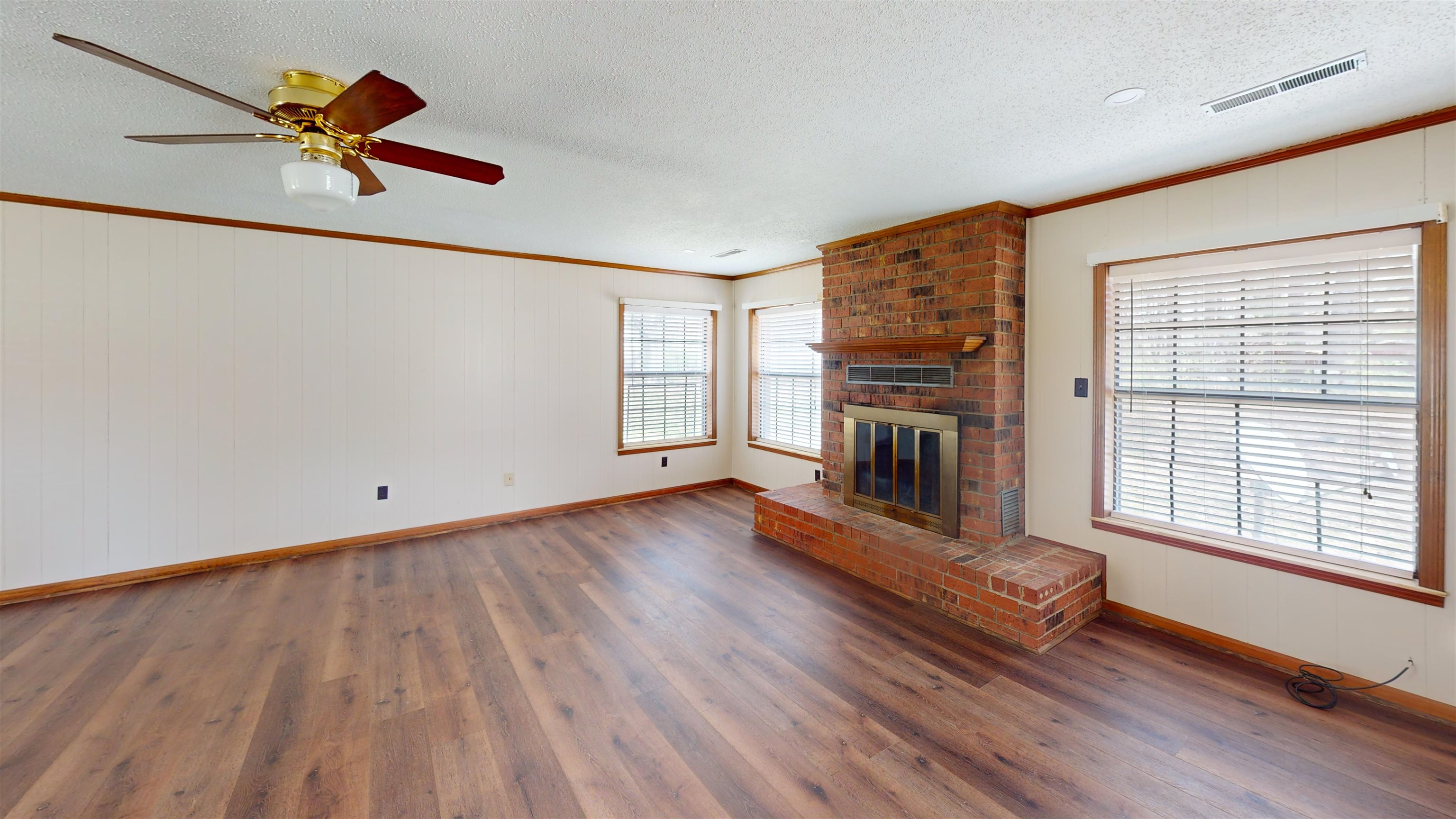 4800 Highway 196 Piperton, TN 38017 - Photo 5 of 37 a view of livingroom with hardwood floor and a ceiling fan