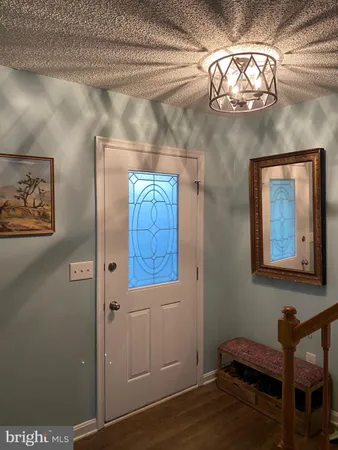 a view of a hallway with workspace