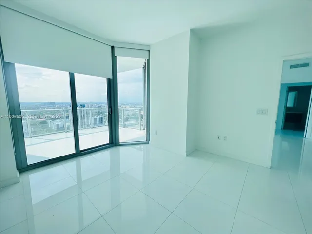 a kitchen with appliances and cabinets