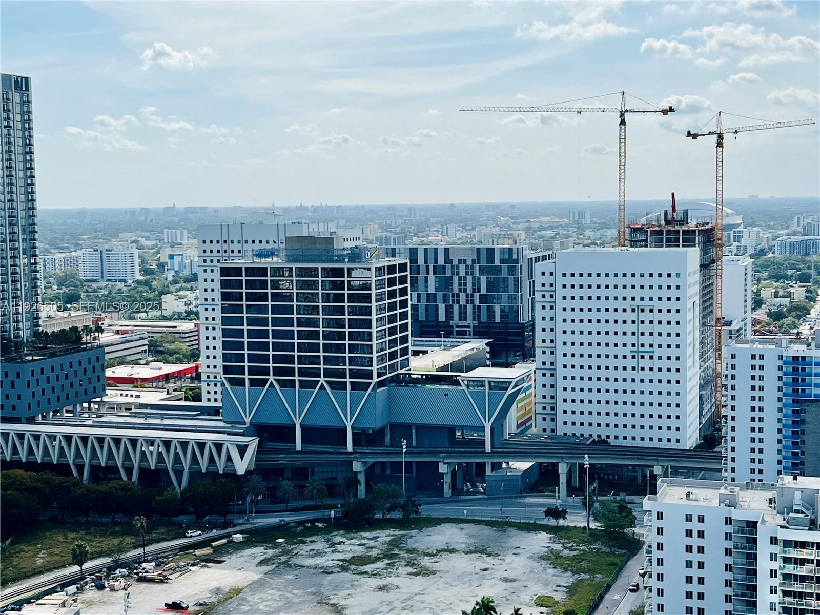 851 Northeast 1st Avenue, Unit 2808 Miami, FL 33132 - Photo 26 of 86 a view of a city that has tall buildings