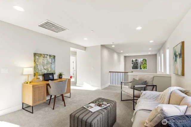 a living room with furniture and a table