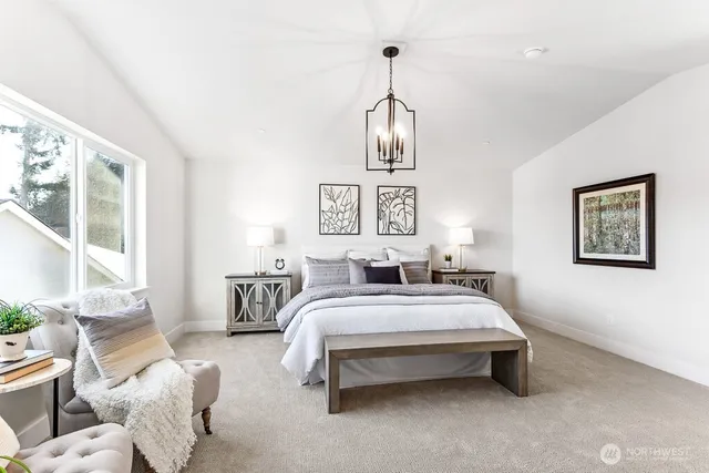 a bedroom with bed and a window