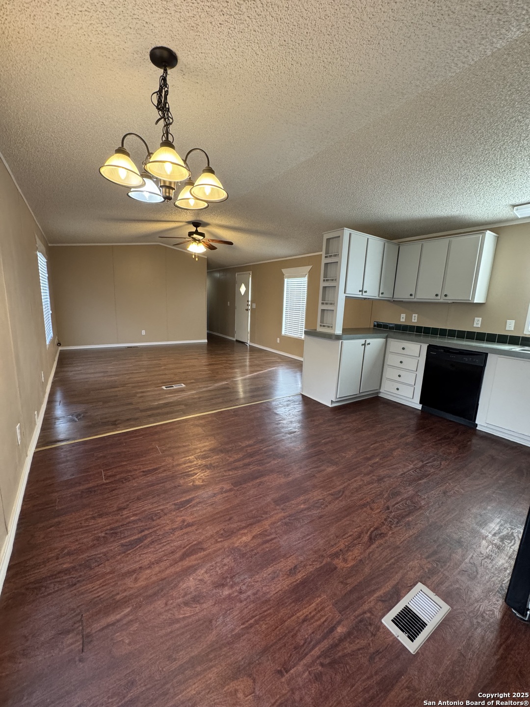 110 Deer Park Road, Unit B La Vernia, TX 78121 - Photo 7 of 12 a view of an empty room with a window