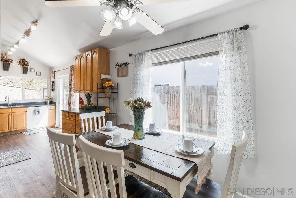 8659 Cordial Road El Cajon, CA 92021 - Photo 7 of 16 a living room with furniture and a large window